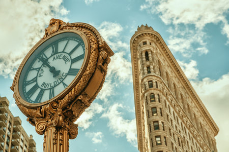 New York City, USA - November 29, 2018: Fifth Avenue Clock with the Flatiron Buildingのeditorial素材