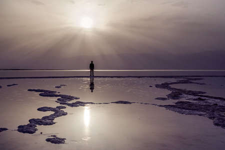 Silhouette on the coast of Dead Sea . Israelの写真素材