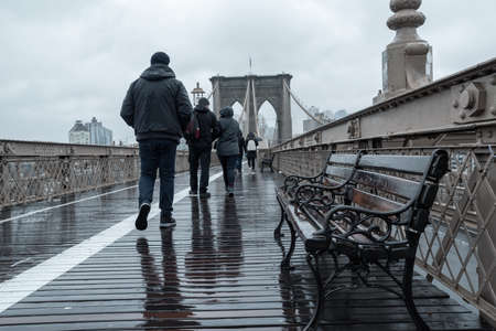11/24/2019: Brooklyn Bridge at rainy day in New York. USAの写真素材