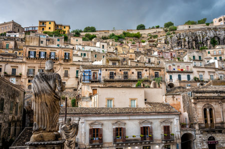 View of the ancient town Modica and sculptures of the church or Dome of San Pietro (Saint Peter), Sicily, Italyのeditorial素材