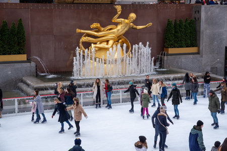 New York City - December 16, 2016: Ice skate at ice rink of Rockefeller Center in New York City, USAのeditorial素材
