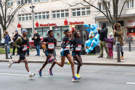 Berlin, Germany, April 3, 2022: Half Marathon in Berlin. Athletes run on Otto-Suhr-Allee, Charlottenburg.のeditorial素材
