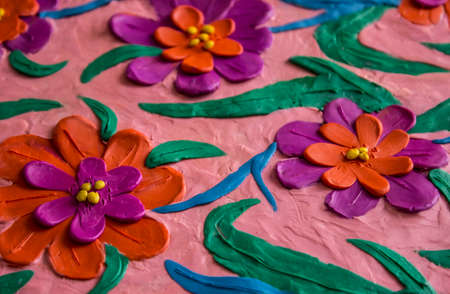 Colorful spring flowers made of plasticine kidの写真素材