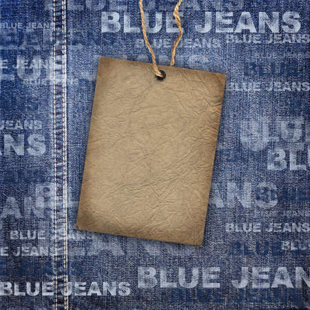 Background denim texture with cardboard labelの写真素材