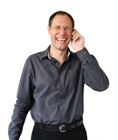 Smiling man with mobile phone isolated on the white backgroundの写真素材