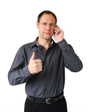 Smiling man with mobile phone isolated on the white backgroundの写真素材