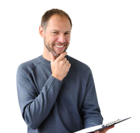 Smiling man in gray with a tablet isolated on whiteの写真素材