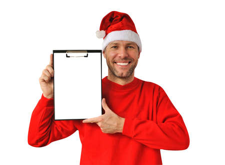 Smiling christmas man wearing a santa hat  isolated on the white backgroundの写真素材