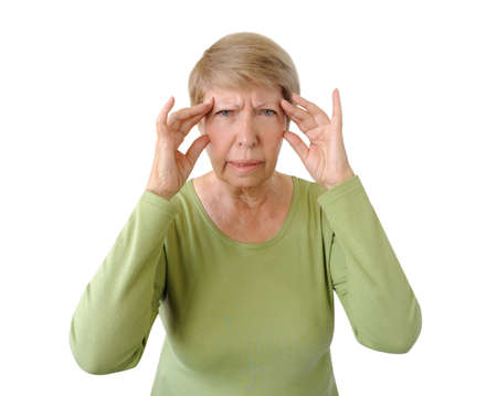 Old woman with a headache isolated on the white backgroundの写真素材