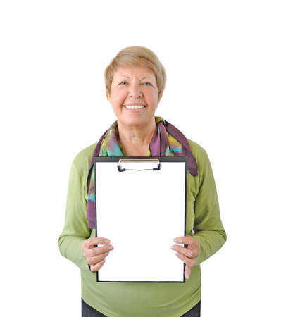 Smiling woman in green with a tablet isolated on white backgroundの写真素材
