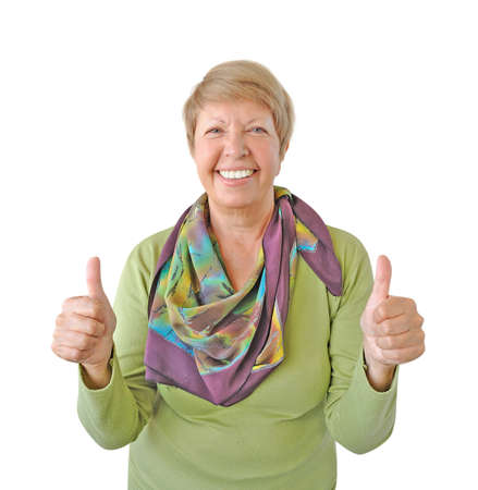 Smiling woman in green showing thumb up isolated on white backgroundの写真素材