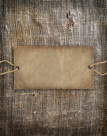 Background texture vintage burlap with labelの写真素材
