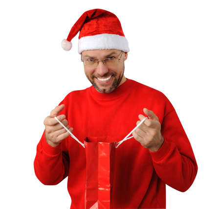 Smiling christmas man wearing a santa hat isolated on the white backgroundの写真素材