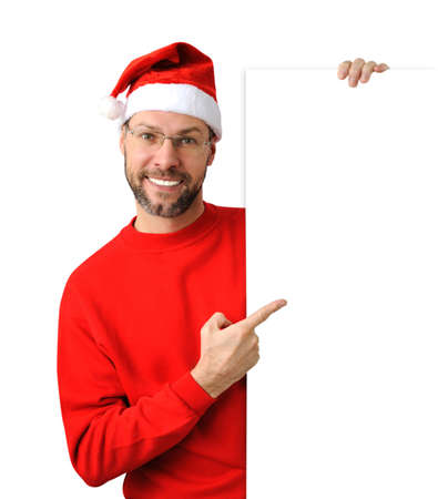 Smiling christmas man wearing a santa hat isolated on the white backgroundの写真素材
