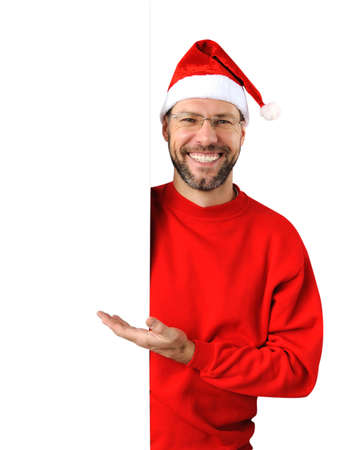 Smiling christmas man wearing a santa hat isolated on the white backgroundの写真素材