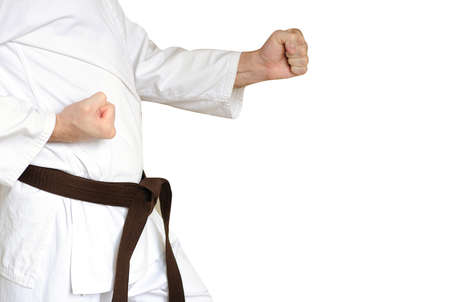 Man in a kimono and belt for martial arts on the white backgroundの写真素材