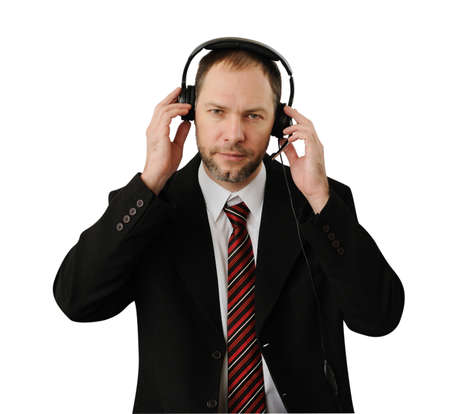 Man in suit with headset isolated on whiteの写真素材