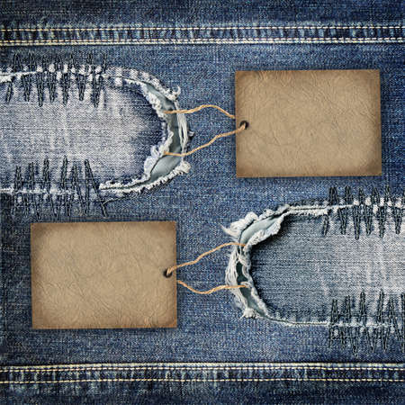 Background denim texture with cardboard labelの写真素材