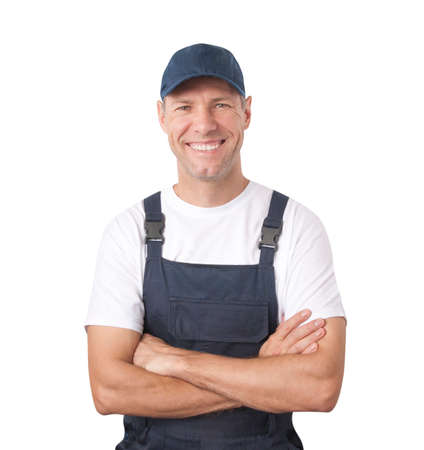 Portrait of smiling worker in blue uniform isolated on white backgroundの写真素材