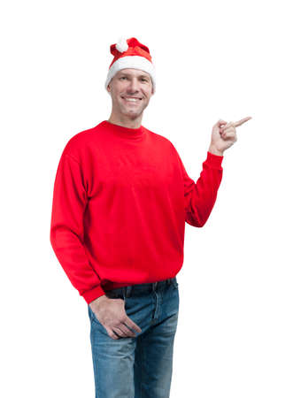 Smiling christmas man wearing a santa hat isolated on the white backgroundの写真素材