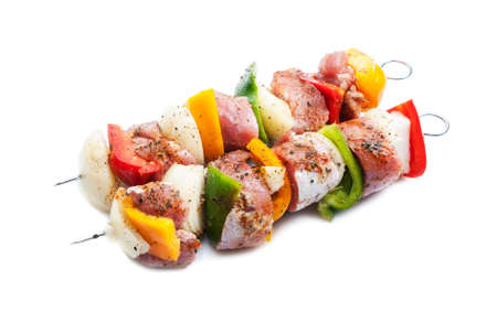 shish kebab on skewers isolated on white backgroundの写真素材