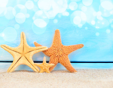 Summer beach. Three starfish.