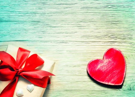 Vintage gift box on old wooden background.の写真素材