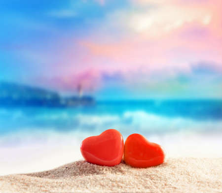 Two hearts on the summer beach. Valentines day.の写真素材