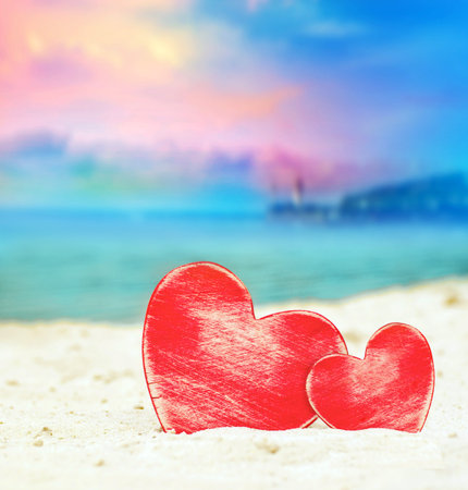 Two hearts on the summer beach. Valentines day.の写真素材