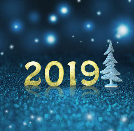 Set of gold shiny digits on glitter background. New year 2018 background. Christmasの写真素材