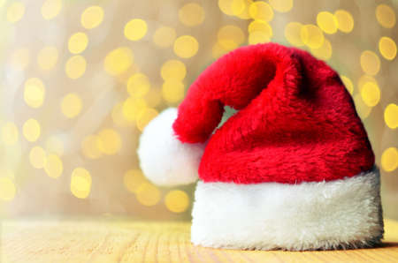 Christmas concept. Christmas decoration. Santa hat with abstract blur background. Soft focus.の写真素材