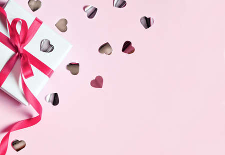 Valentine day composition. White gift box with bow and hearts. Top View. View from above.の写真素材