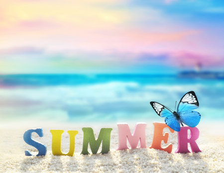 Summer beach. Word summer of color letters on summer beach and butterfly on a background of ocean.の写真素材
