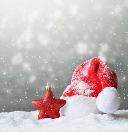 Santa hat on snow. Christmas or New Year decoration.の写真素材
