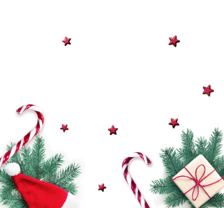 Christmas composition. Gift, fir, Christmas hat and sweet crutch on white background. Christmas,...