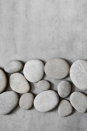 Gray spa stones and grey background. Spa concept.の写真素材