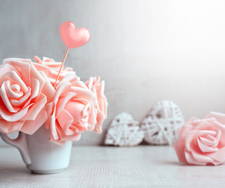 Roses, cup and hearts on gray background. Holiday concept. Valentines day.の写真素材