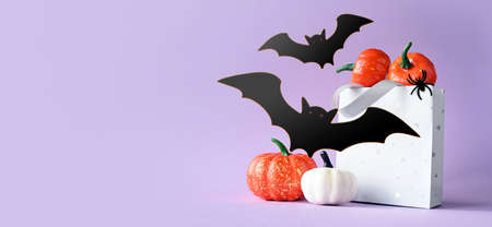 Halloween pumpkins, bats and shopping bag. Happy halloween concept.の写真素材