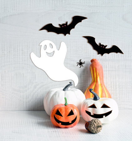 Halloween decorations on pastel gray background. Halloween concept. Pumpkin, spider, bat and ghost.の写真素材