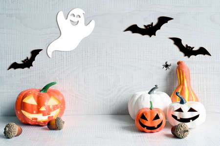 Halloween decorations on pastel gray background. Halloween concept. Pumpkin, spider, bat and ghost.の写真素材
