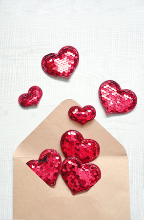 Envelope and red hearts on white background. Valentine's day, love, anniversary conceptの写真素材