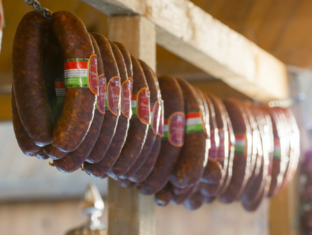 SZEGED, HUNGARY - NOVEMBER 8. 2014 - Row of sausages in a food market in the Mangalitsa Festival in Szegedのeditorial素材