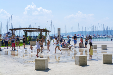 BALATONFURED, HUNGARY - AUGUST 4. 2015 - Fountain in the ship port of Balatonfured, Hungaryのeditorial素材