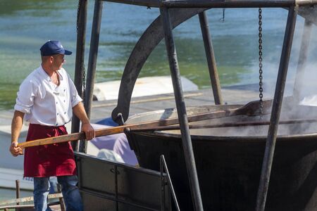 SZEGED, HUNGARY - SEPTEMBER 06. 2015 - Giant kettle of fish soup in the International Tisza Fish Soup Festival in Szegedのeditorial素材
