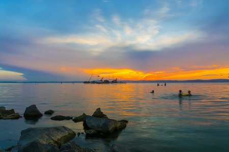 Sunset over Lake Balaton at the Golden Beach of Siofok, Hungaryの写真素材