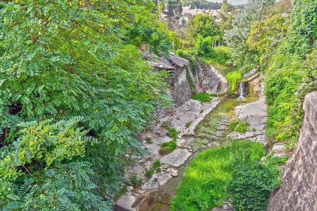 Valley of Sed patak (creek) with old houses in Szekszard, Hungaryの写真素材