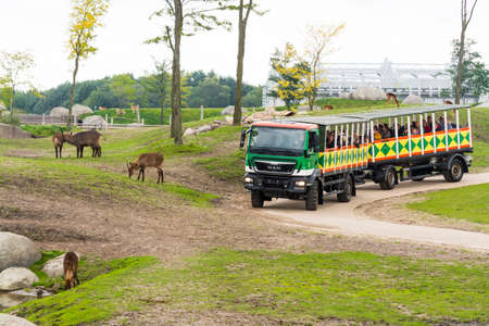 EMMEN, THE NETHERLANDS - SEPTEMBER 20, 2017: Safari bus in the Wildlands, the zoo of Emmenのeditorial素材
