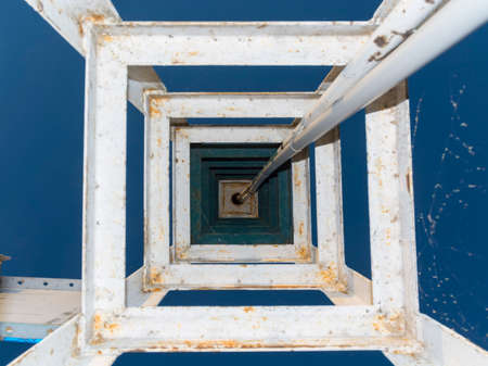 Iron frame of a column with evening sky at Lake Balatonの写真素材