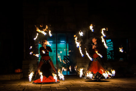 Fire jugglers in a Hallloween program in Szeged Zooのeditorial素材