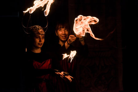 Fire jugglers in a Hallloween program in Szeged Zooのeditorial素材